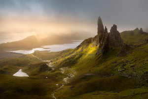 Dark and moody low clouds over the iconic Old Man of Storr on the Isle of Skye, Scotland, UK.
